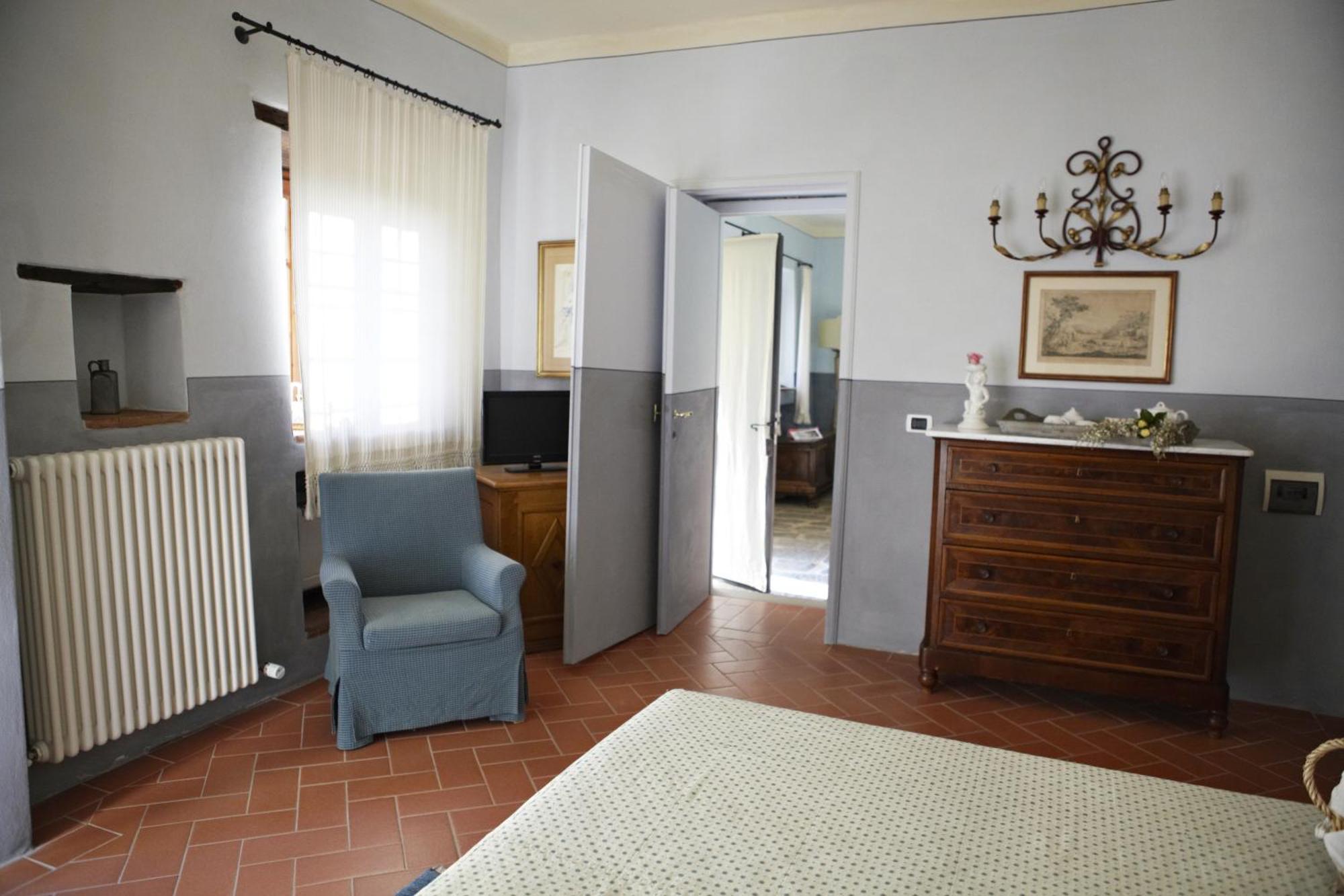 Relais Villa Belpoggio - Residenza D'Epoca Loro Ciuffenna Habitación foto