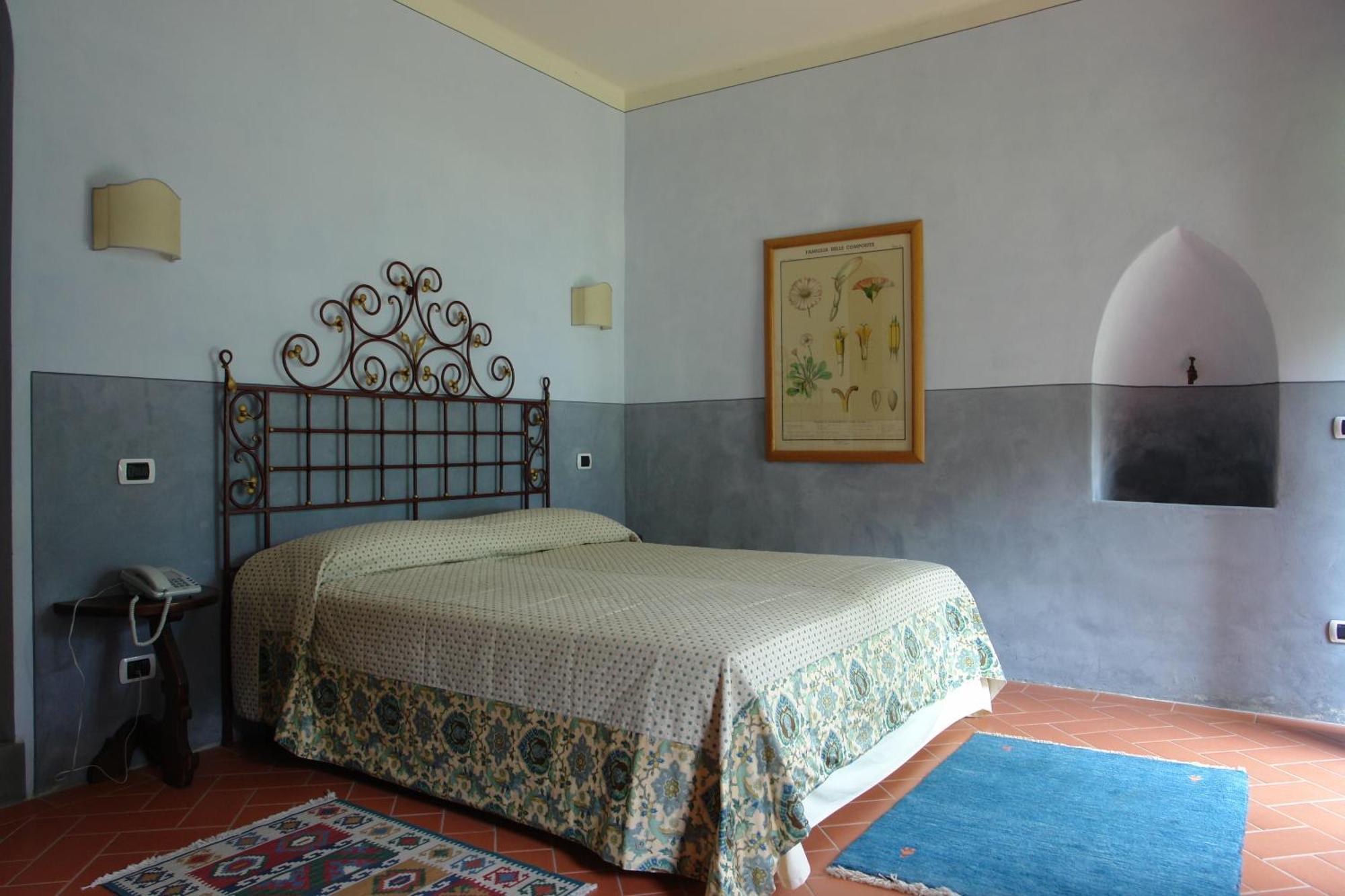Relais Villa Belpoggio - Residenza D'Epoca Loro Ciuffenna Habitación foto