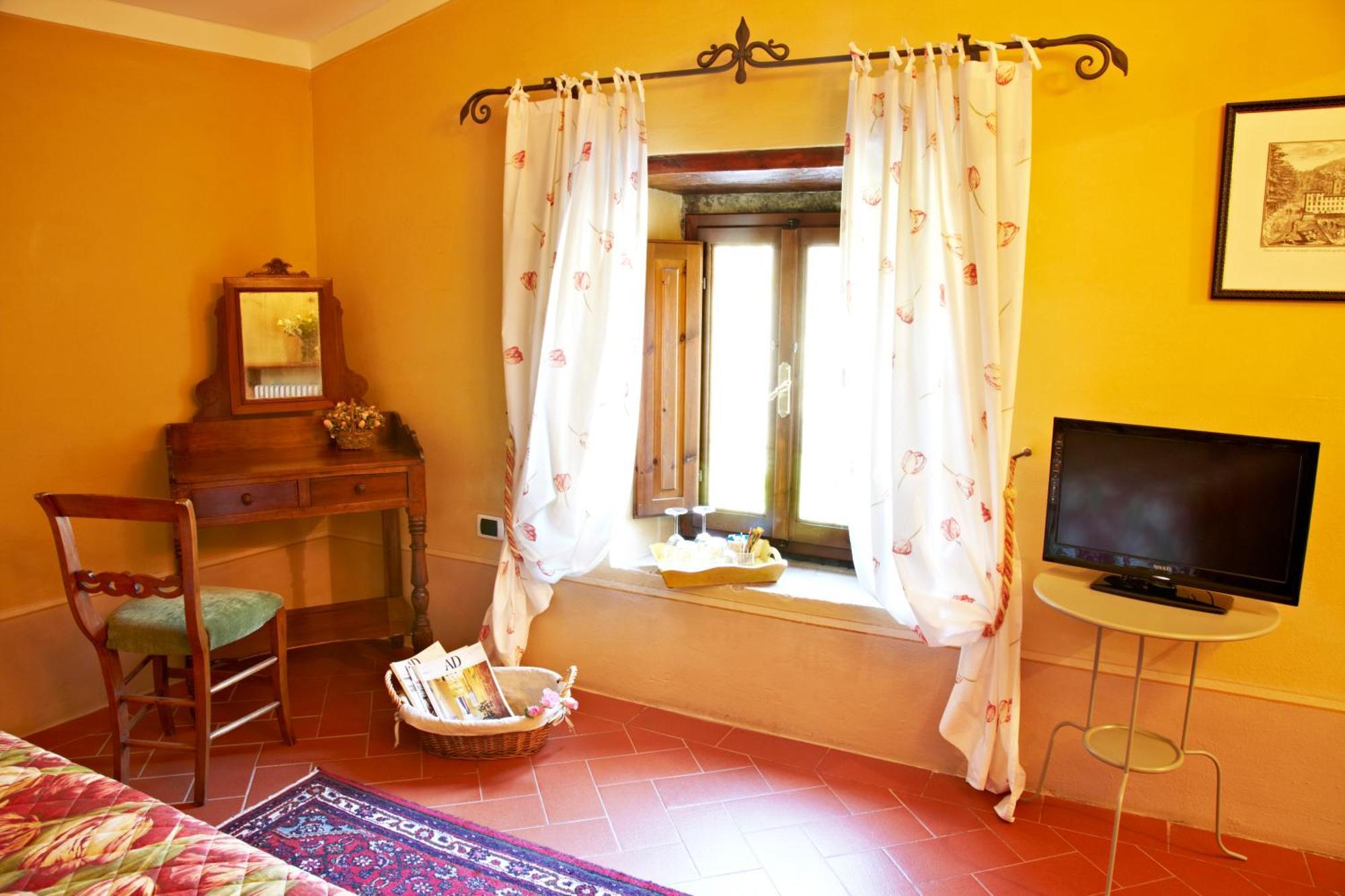 Relais Villa Belpoggio - Residenza D'Epoca Loro Ciuffenna Habitación foto
