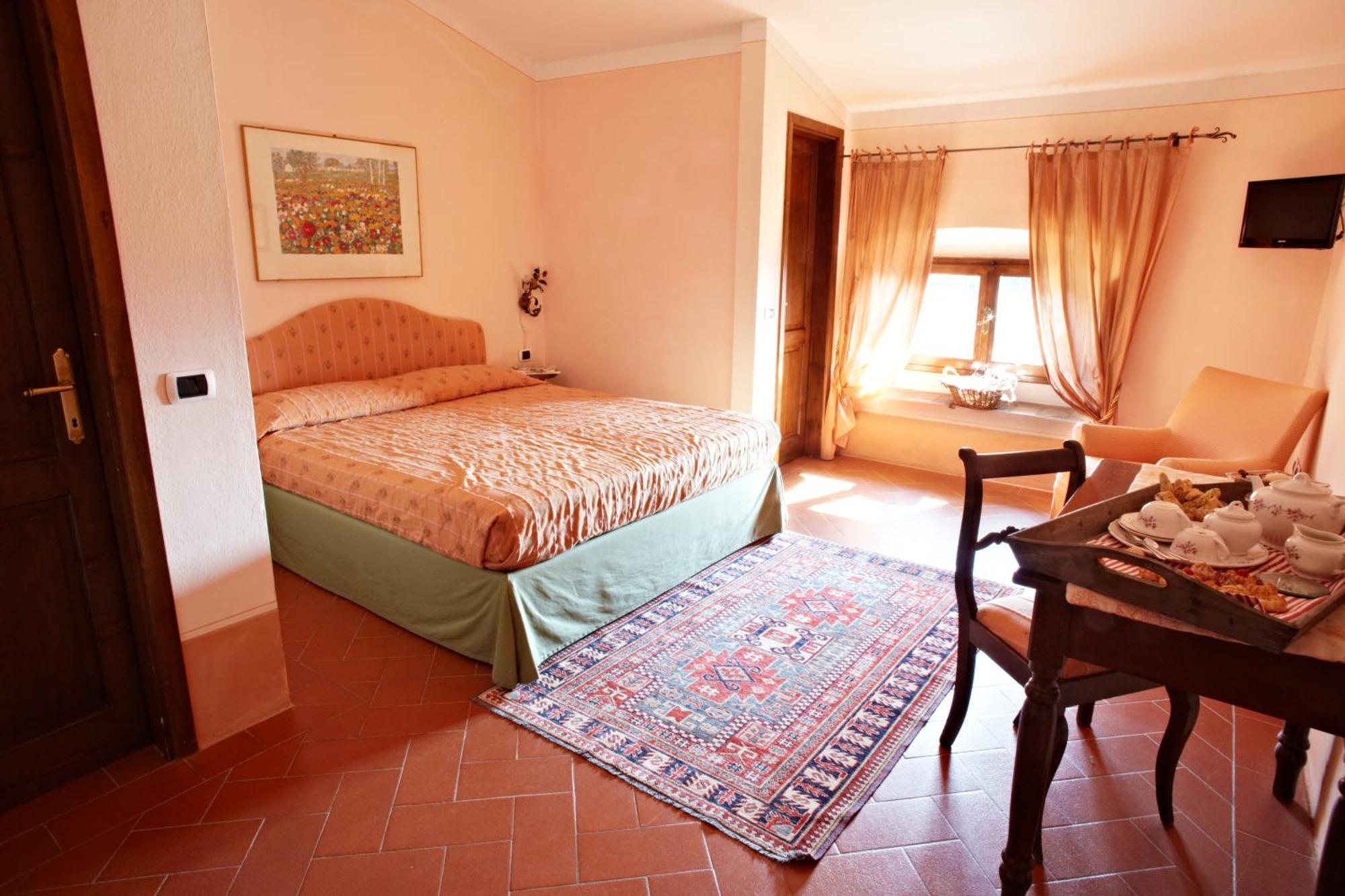 Relais Villa Belpoggio - Residenza D'Epoca Loro Ciuffenna Habitación foto