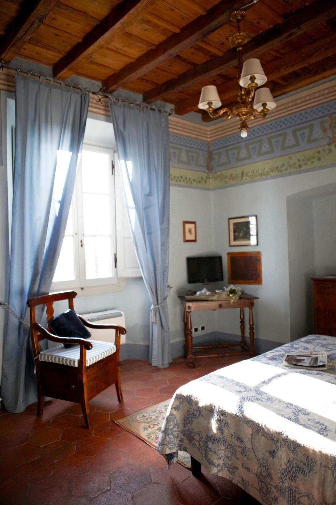 Relais Villa Belpoggio - Residenza D'Epoca Loro Ciuffenna Habitación foto