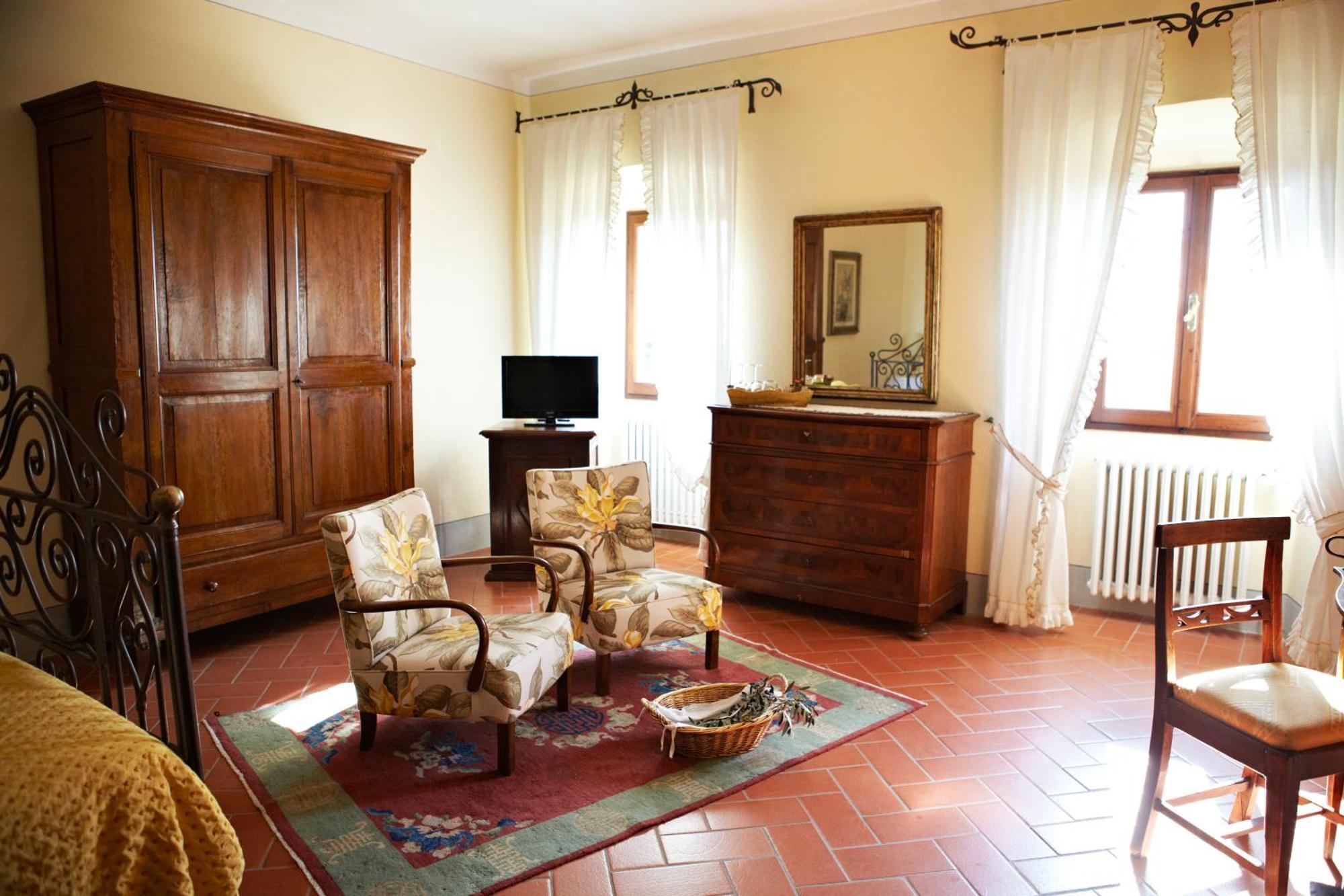 Relais Villa Belpoggio - Residenza D'Epoca Loro Ciuffenna Habitación foto